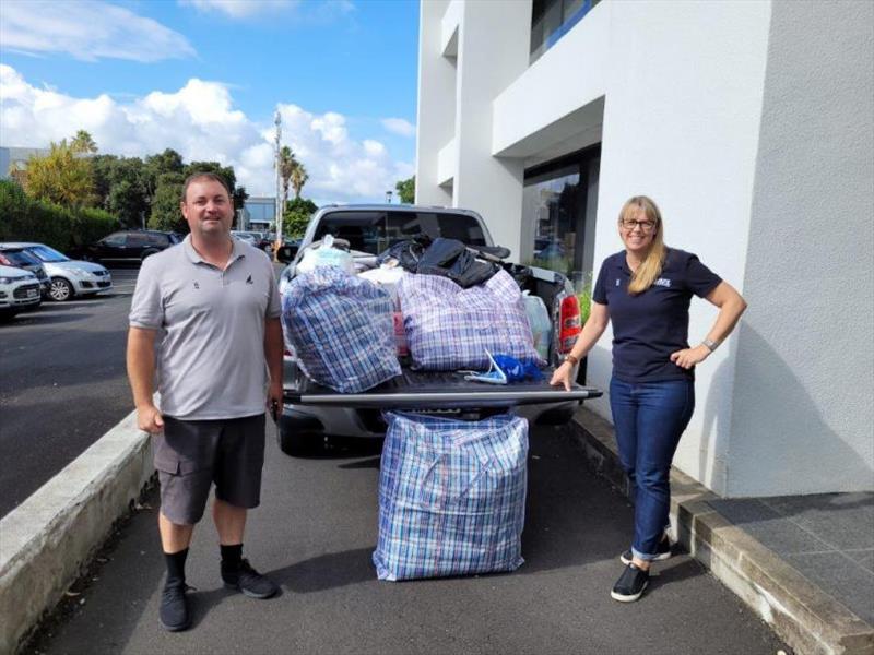 Raynor Haagh, Yachting NZ's National Sport Development Director, and regional development manager Hayden Whitburn with items donated by the organisation photo copyright Yachting NZ taken at Yachting New Zealand and featuring the  class