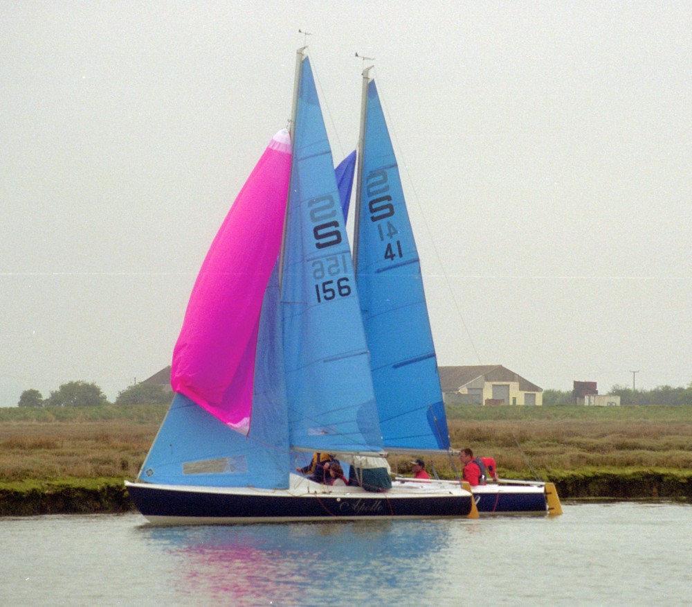 A dual along the shore at the Sandhopper nationals photo copyright Peter Freshwater taken at Maylandsea Bay Sailing Club and featuring the Sandhopper class