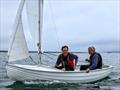 Yachtsman, boatbuilder and 1977 Yachtsman of of the Year award winner Jeremy Rogers from Lymington, enjoying one of his last sails with son David Rogers in one of the Keyhaven Scows that Jonathan built © Mark Jardine / PPL