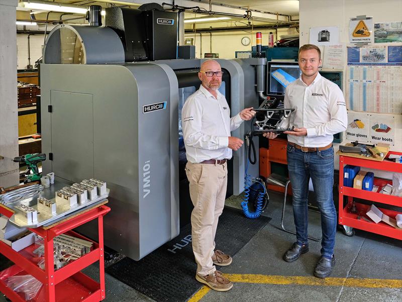 Standing in front of the Hurco VM10i machining centre in Sea Sure's Warsash, Southampton factory are Graham Brown (left), managing director and sales manager Dan Henderson, holding one of the company's SHOCK-WBV shock mitigation products photo copyright Sea Sure taken at  and featuring the  class