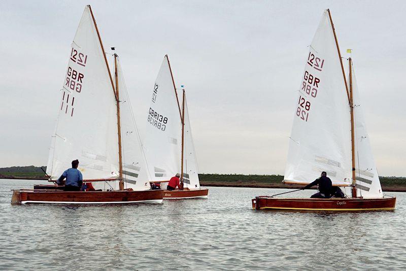 Southern Cross catching up - Light winds for Sharpie open meeting at Overy Staithe photo copyright Jeremy Neville-Eliot taken at Overy Staithe Sailing Club and featuring the Sharpie class