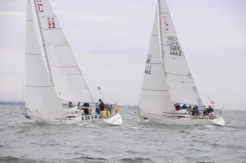 The Sigma 33, Excelle, racing at the 2013 event photo copyright Rick Tomlinson / www.rick-tomlinson.com taken at Cowes Combined Clubs and featuring the Sigma 33 class