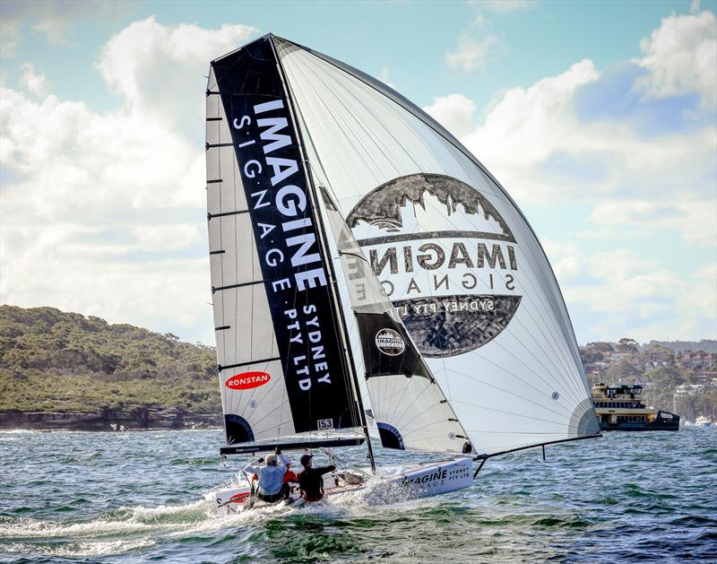 Winner Heat2 Imagine Signage photo copyright Sail Media taken at Manly 16ft Skiff Sailing Club and featuring the 16ft Skiff class