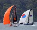 Different angles for two teams on the spinnaker run down the middle of the course - 2022-23 NSW Championship