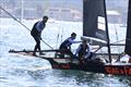 18ft Skiff NSW Championship Day 1 - Seve Jarvin watches on as Max Nearn and Ryan Ewings prepare to round the weather mark