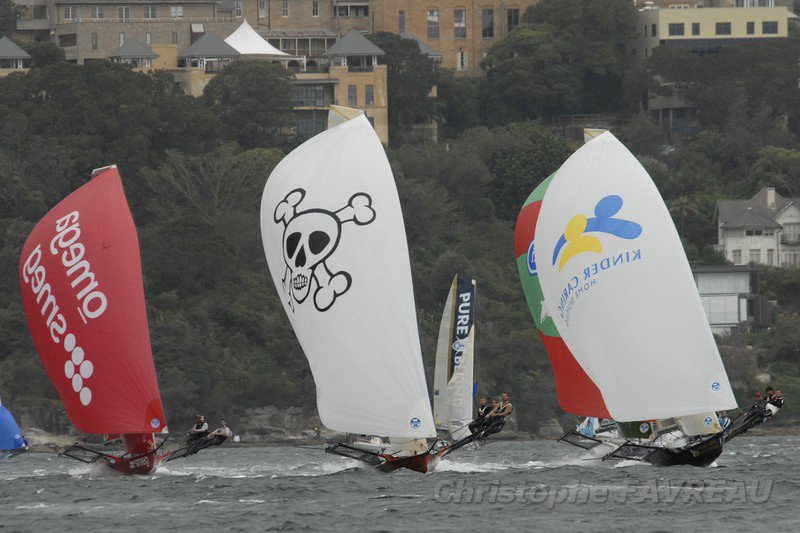 More overcast conditions for race 2 of the J.J. Giltinan 18ft Skiff Championship photo copyright Christophe Favreau / www.christophefavreau.book.fr taken at Sydney Flying Squadron and featuring the 18ft Skiff class