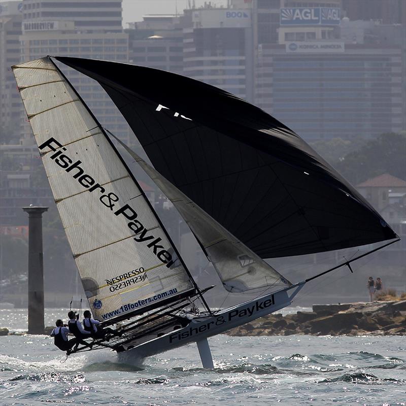 Fisher & Paykel airborne in race 2 of the 18ft Skiff Australian Championship photo copyright Frank Quealey taken at Australian 18 Footers League and featuring the 18ft Skiff class