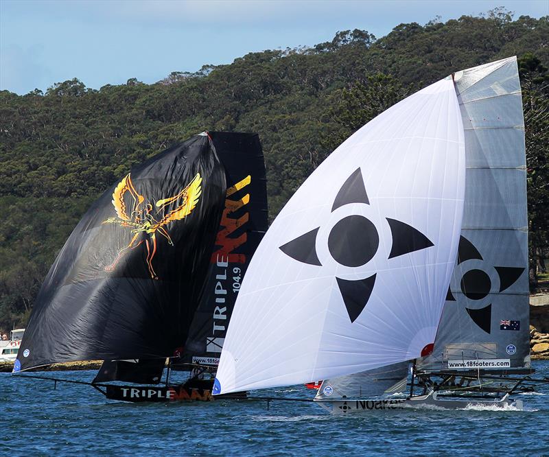 Noakes Youth led Triple M on the spinnaker run from Rose Bay to the wing mark off Clark Island during race 7 of the 18ft Skiff Spring Championship in Sydney photo copyright Frank Quealey taken at Australian 18 Footers League and featuring the 18ft Skiff class