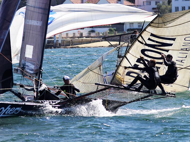 Rag and Famish Hotel passes Peroni during the 18ft Skiff Queen of the Harbour - photo © Frank Quealey