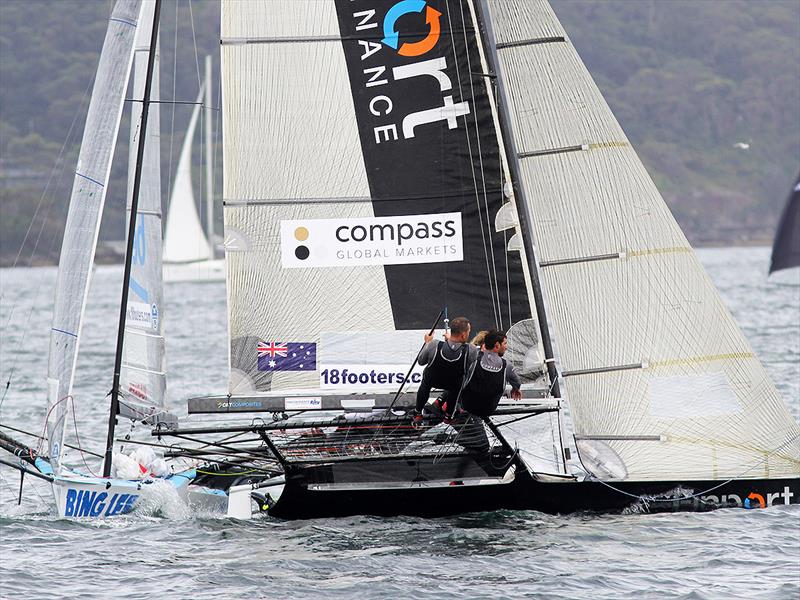 Finport home just 6s ahead of Bing Lee to take out race 1 of the 18ft Skiff Club Championship on Sydney Harbour photo copyright Frank Quealey taken at Australian 18 Footers League and featuring the 18ft Skiff class