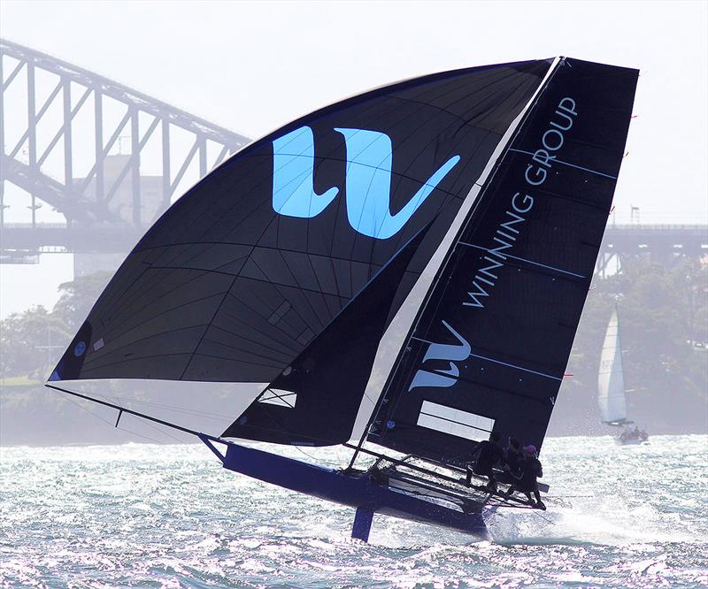 Winning Group airborne as the team approaches the bottom mark on the second lap of the course during 18ft Skiff NSW Championship race 3 photo copyright Frank Quealey taken at Australian 18 Footers League and featuring the 18ft Skiff class