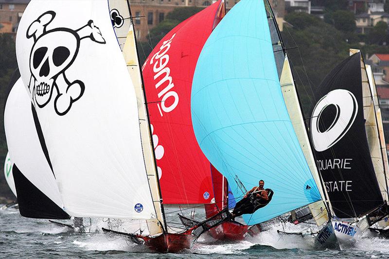 The familiar spinnaker of appliancesonline leading the pack downwind photo copyright Frank Quealey taken at Australian 18 Footers League and featuring the 18ft Skiff class