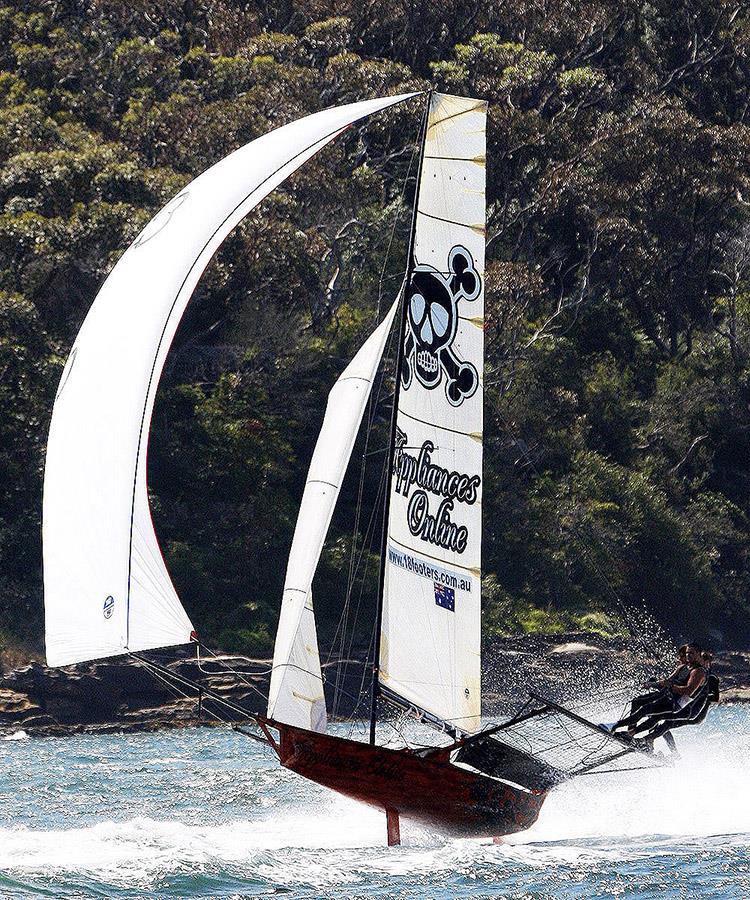 John Winning Jr. has appliancesonline.com.au 'flying' in a North-East wind on Sydney Harbour photo copyright Frank Quealey taken at Australian 18 Footers League and featuring the 18ft Skiff class