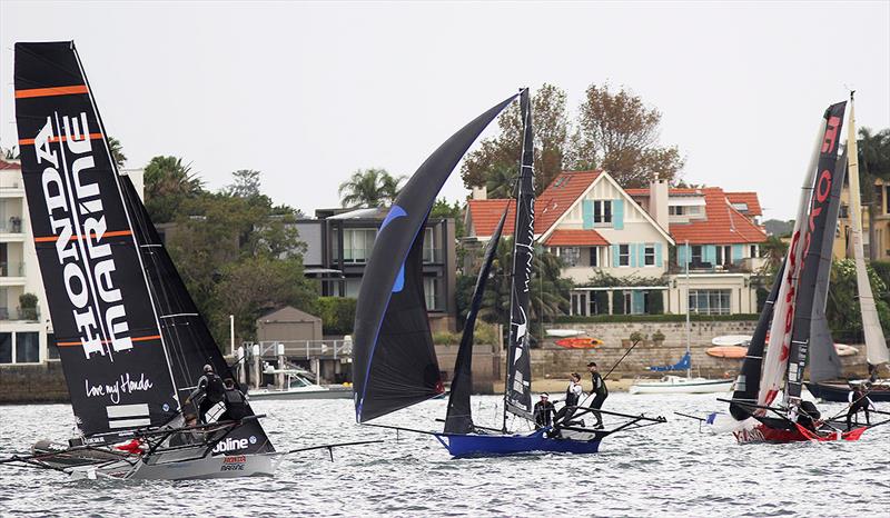 Winning Group laeds Asko Appliances as Honda Marine comes into the top mark on day 4 of the 18ft Skiff JJ Giltinan Championship photo copyright Frank Quealey taken at Australian 18 Footers League and featuring the 18ft Skiff class