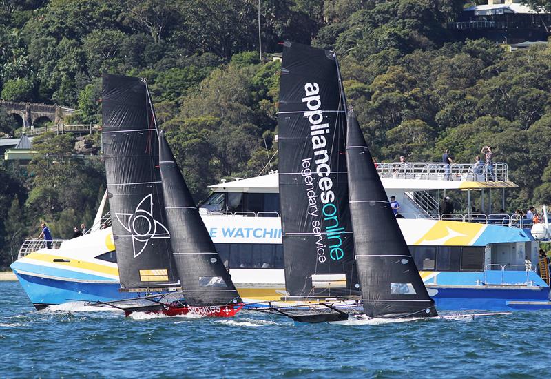 The two leaders set out on the final windward leg of the course in race 2 of the 18ft Skiff Spring Championship on Sydney Harbour - photo © Frank Quealey