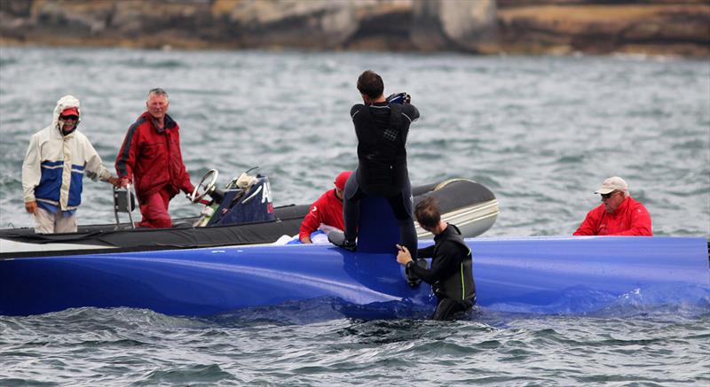 The storm ruined Winning Group's chances in race 4 of the 18ft Skiff Spring Championship on Sydney Harbour photo copyright Frank Quealey taken at Australian 18 Footers League and featuring the 18ft Skiff class