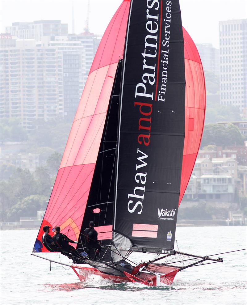 Shaw and Partners Financial Services led the fleet down the first long spinnaker run in race 1 of the 18ft Skiff NSW Championship photo copyright Frank Quealey taken at Australian 18 Footers League and featuring the 18ft Skiff class