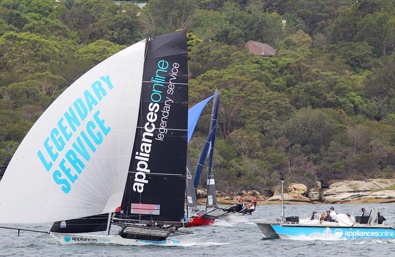 Appliancesonline.com.au crosses Shaw and Partners and R Marine Pittwater while the video coverage team look on during day 1 of the 18ft Skiff Australian Championship photo copyright Frank Quealey taken at Australian 18 Footers League and featuring the 18ft Skiff class