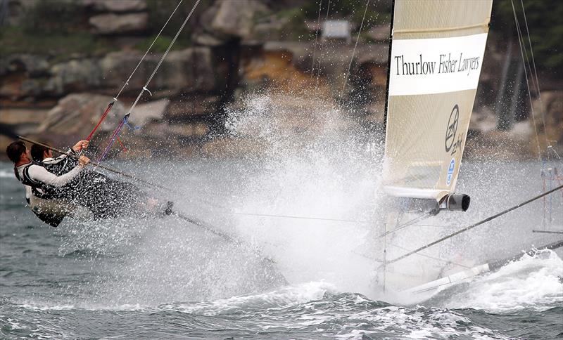 Michael Coxon drives Thurlow Fisher Lawyers into the wind. - photo © Frank Quealey