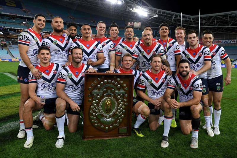 World Rugby League champion Roosters team with the JJ Giltinan Shield photo copyright ARFL taken at Australian 18 Footers League and featuring the 18ft Skiff class