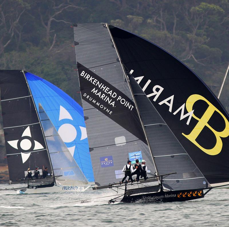 Birkenhead Point Marina and Noakes Blue at top speed down a long southerly spinnaker run photo copyright Frank Quealey taken at Australian 18 Footers League and featuring the 18ft Skiff class