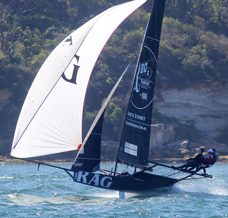 Rag and Famish Hotel shows her spinnaker style photo copyright Frank Quealey taken at Australian 18 Footers League and featuring the 18ft Skiff class