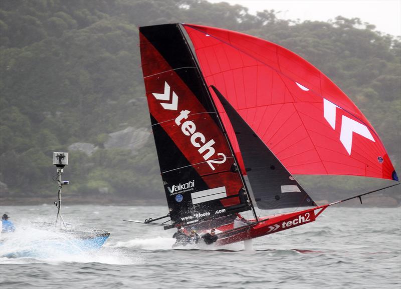 tech2 shows her electrifying downwind speed while the AeroMedia Live Broadcast team try to stay close behind to capture all the action photo copyright Frank Quealey taken at Australian 18 Footers League and featuring the 18ft Skiff class
