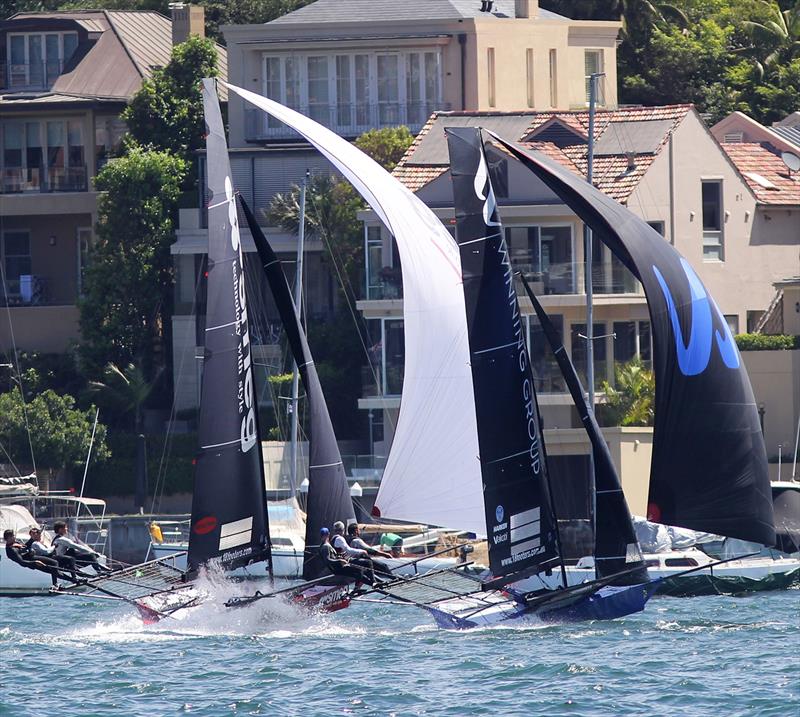 Smeg chases Winning Group to take over third place on the first spinnaker run during the 18ft Skiff NSW Championship final race - photo © Frank Quealey