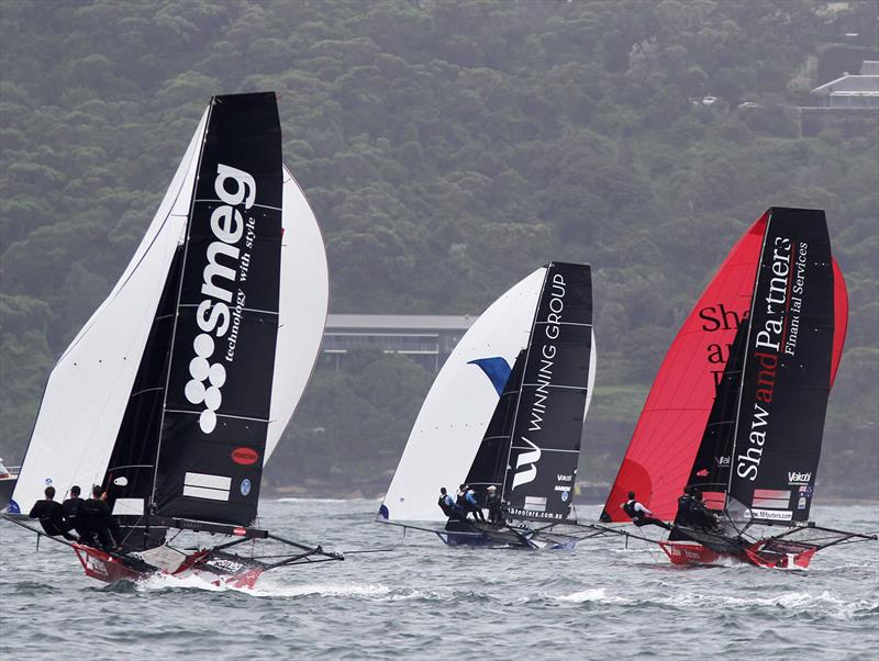 Three leaders on the spinnaker run to the bottom mark in Race 5 of the 18ft Skiff Australian Championship - photo © Frank Quealey