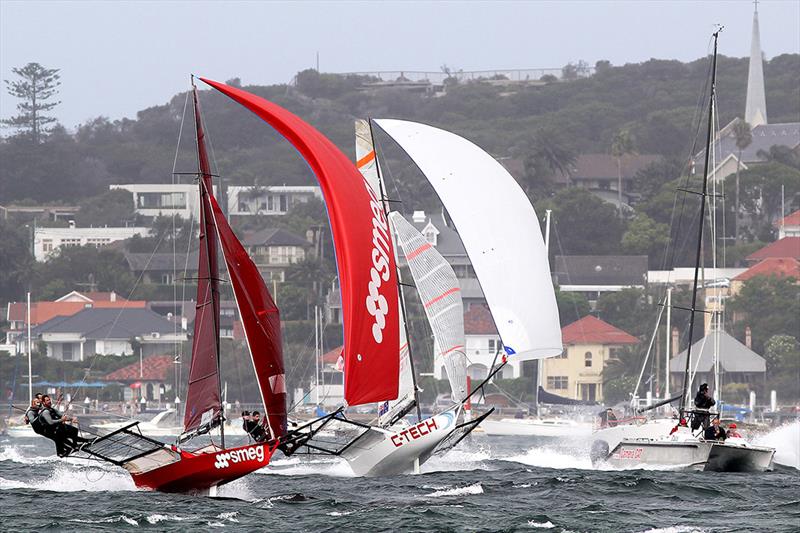 Smeg and C-Tech race downwind in a North East wind during the 2013 JJ Giltinan Championship photo copyright Frank Quealey taken at Australian 18 Footers League and featuring the 18ft Skiff class
