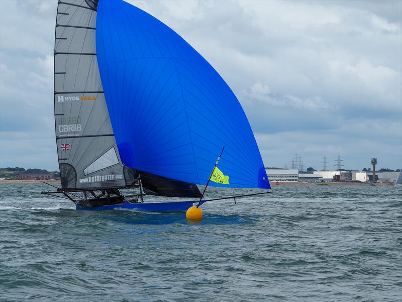 18ft Skiff racing at Calshot photo copyright Kate Sullivan taken at  and featuring the 18ft Skiff class