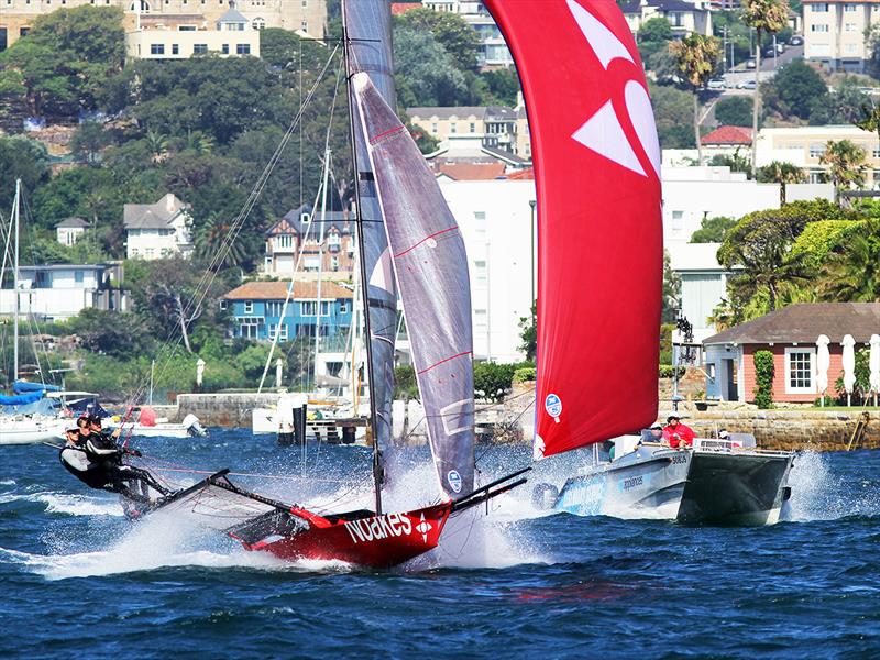 Sean Langman's Noakesailing with the club's video team in hot pursuit photo copyright Frank Quealey taken at Australian 18 Footers League and featuring the 18ft Skiff class