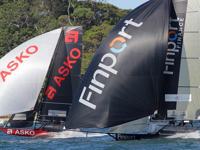 Finport Finance grabs fourth place from Asko Appliances on the final spinnaker run photo copyright Frank Quealey taken at Australian 18 Footers League and featuring the 18ft Skiff class
