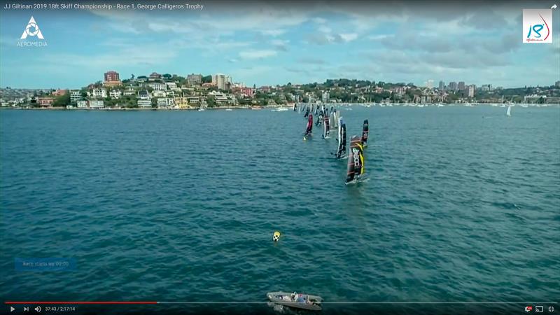 Start time image showing all boats clearly behind the start line - yet two were called over - ASCC (nearest drone camera) and ASKO close to the yellow bouy which is close to the start line photo copyright 18fter TV taken at Australian 18 Footers League and featuring the 18ft Skiff class