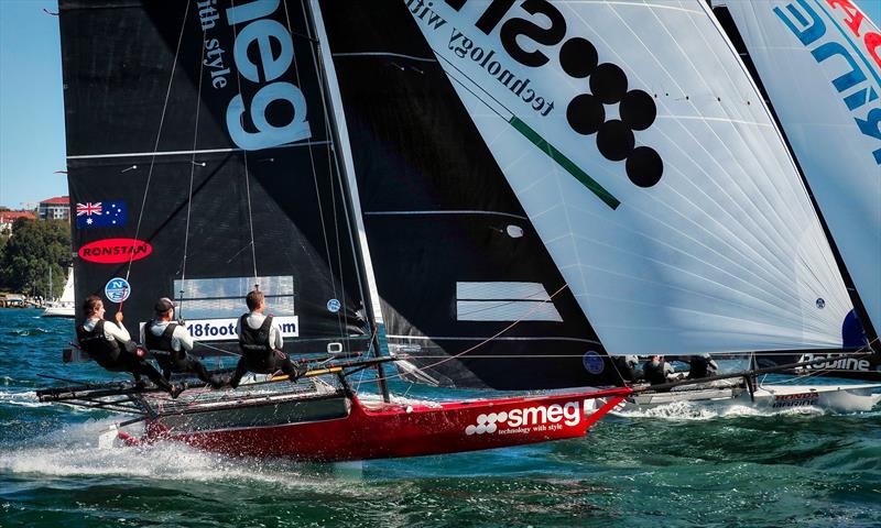 A hastily repaired Smeg drives over Honda Marine - Race 2 - JJ Giltinan Championship 2019, March 3, 2019 photo copyright Michael Chittenden taken at Australian 18 Footers League and featuring the 18ft Skiff class