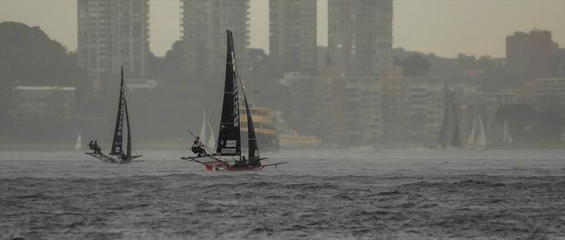 In the wet - Day 4 - 2019 JJ Giltinan Championship, Sydney Harbour, March 2019, photo copyright Michael Chittenden taken at Australian 18 Footers League and featuring the 18ft Skiff class