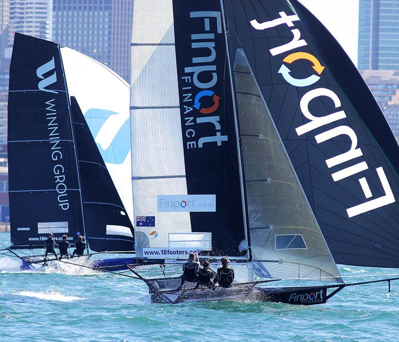 Finport Finance, third placed in the championship, leads 11th placed Winning Group on a tight spinnaker run in Race 3 - 18ft Skiff Spring Championship photo copyright Frank Quealey taken at Australian 18 Footers League and featuring the 18ft Skiff class