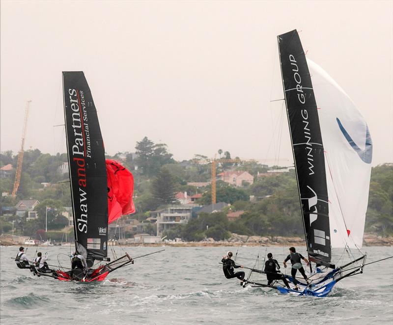 Shaw and Partners Financial Services and Winning Group crews battle to get their spinnakers set after rounding the windward mark - 18ft Skiff NSW Championship photo copyright Michael Chittenden taken at Australian 18 Footers League and featuring the 18ft Skiff class