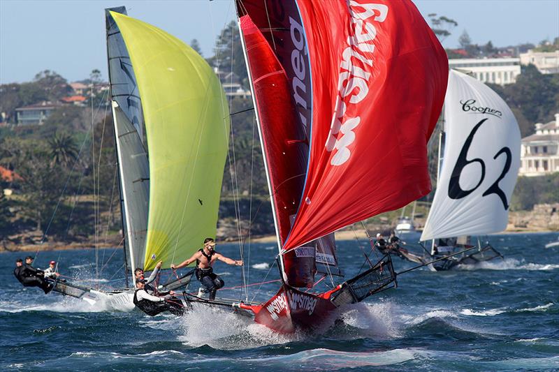 Smeg, skippered by David Witt, leads the fleet to the bottom mark on Sydney Harbour photo copyright Frank Quealey taken at Australian 18 Footers League and featuring the 18ft Skiff class
