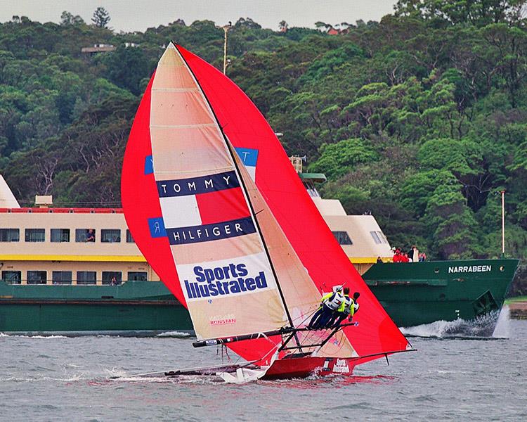 Stephen Quigley takes on the Manly Ferry in Sports Illustrated -Tommy Hilfiger photo copyright Frank Quealey taken at Australian 18 Footers League and featuring the 18ft Skiff class