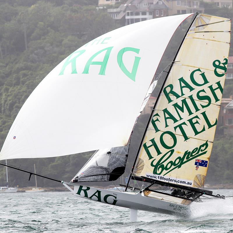 The Rag is barely touching the water on a wild spinnaker run on Sydney Harbour photo copyright Frank Quealey taken at Australian 18 Footers League and featuring the 18ft Skiff class