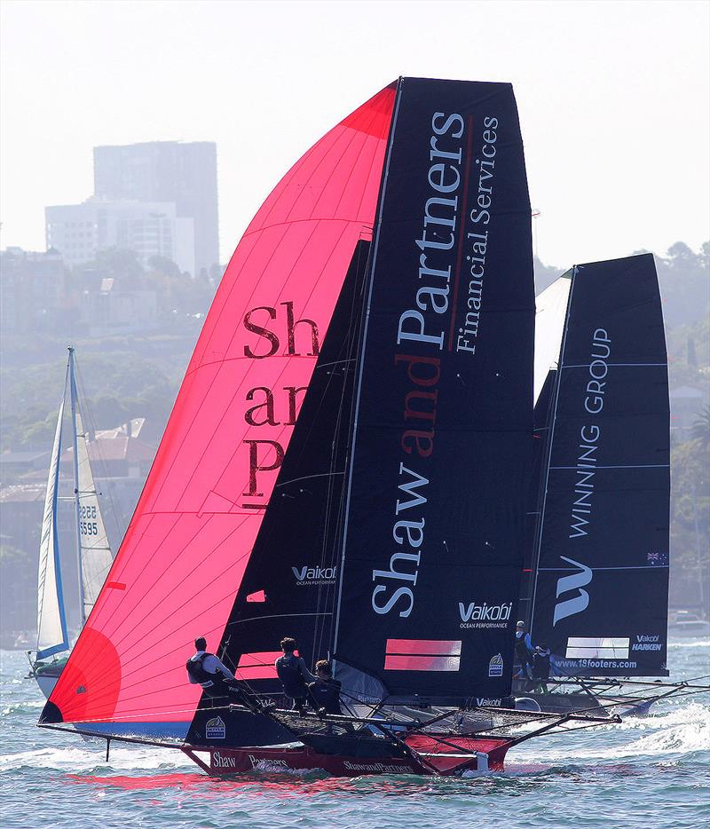 Shaw and Partners Financial Services and Winning Group chasing the leader on the final spinnaker run during race 15 of the 18ft Skiff Club Championship photo copyright Frank Quealey taken at Australian 18 Footers League and featuring the 18ft Skiff class