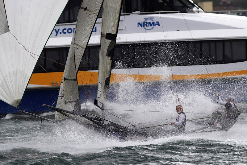 Harbour ferry crosses ahead of race leader Yandoo - 18ft Skiff NSW Championship race 5 photo copyright Frank Quealey taken at Australian 18 Footers League and featuring the 18ft Skiff class