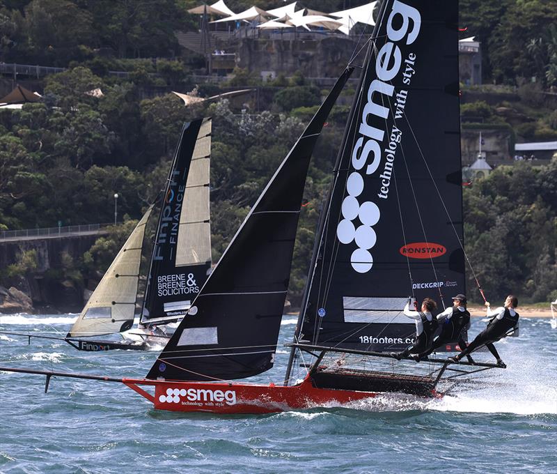 Smeg and Finport Finance battle for the lead on the spinnaker runto the bottom mark at Robertson Point during race 1 of the 100th 18ft Skiff Australian Championship - photo © Michael Chittenden