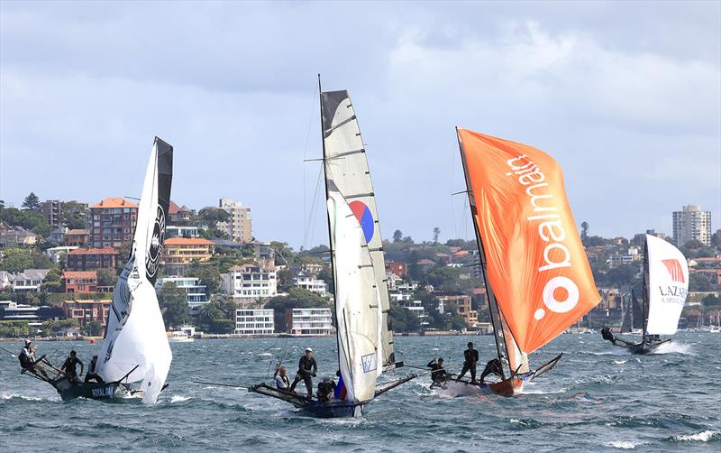 The fleet approaches the bottom mark midway through race 1 of the 100th 18ft Skiff Australian Championship - photo © Michael Chittenden