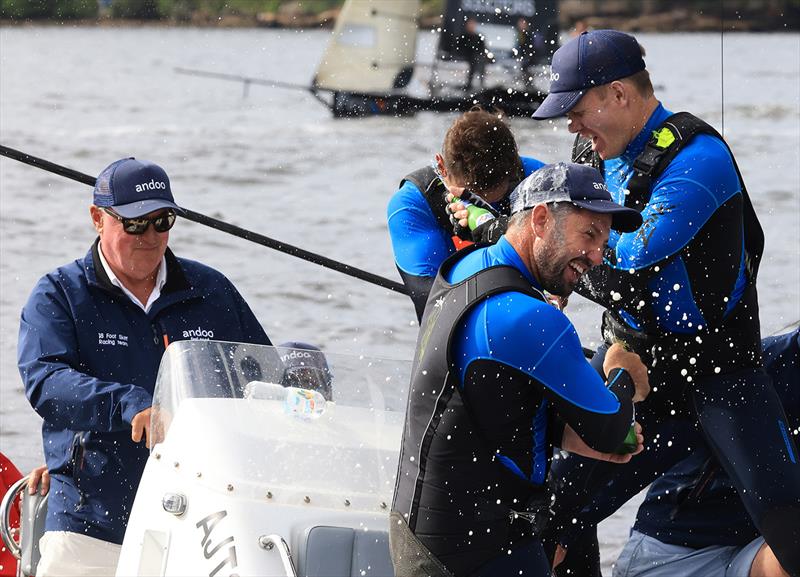 The Andoo team celebrate winning the 2022 JJ Giltinan 18ft Skiff Championship photo copyright Michael Chittenden taken at Australian 18 Footers League and featuring the 18ft Skiff class