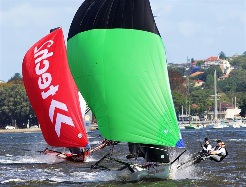 The German team lead NSW champion Tech2 downwind - 2021-22 League 18 Footer Season  photo copyright Frank Quealey taken at Australian 18 Footers League and featuring the 18ft Skiff class