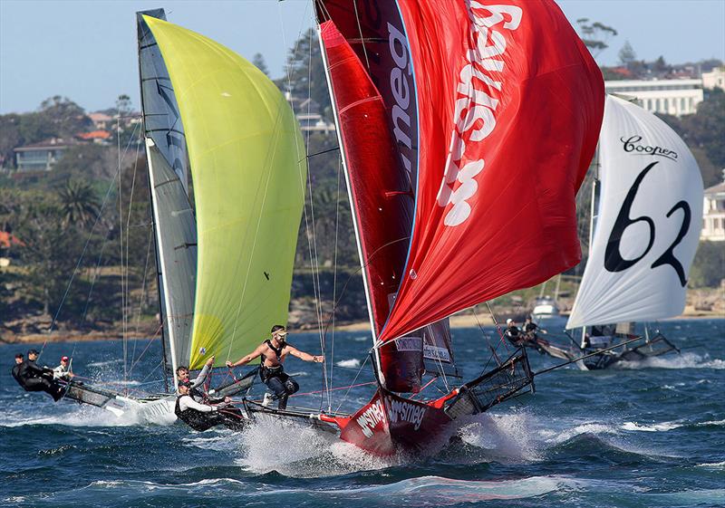 Smeg, with David Witt at the helm, leads the fleet to the bottom mark photo copyright Frank Quealey taken at Australian 18 Footers League and featuring the 18ft Skiff class
