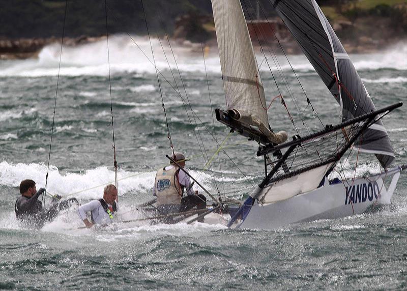 Riding a wild boat in 50-knots, during the 2020-21 season - John 'Woody' Winning photo copyright Frank Quealey taken at Australian 18 Footers League and featuring the 18ft Skiff class