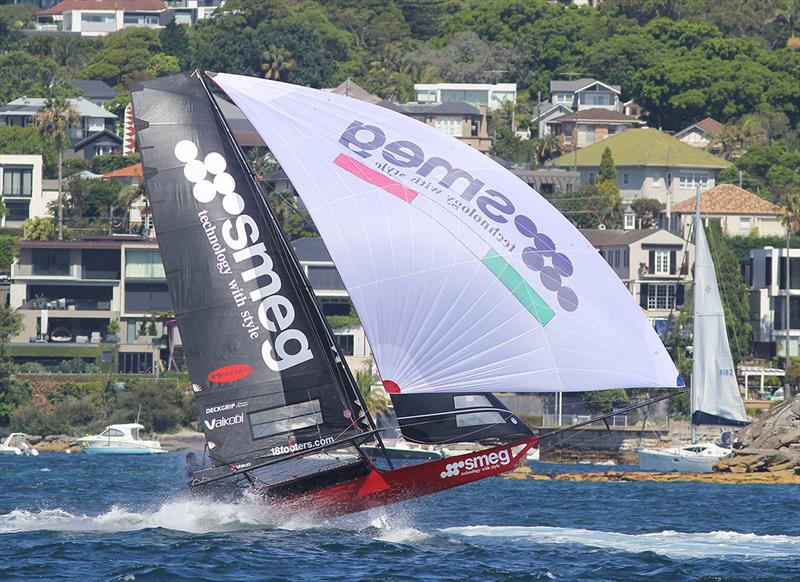 Smeg hits the wake of a passing power boat - NSW 18ft skiff Championship photo copyright Frank Quealey taken at Australian 18 Footers League and featuring the 18ft Skiff class